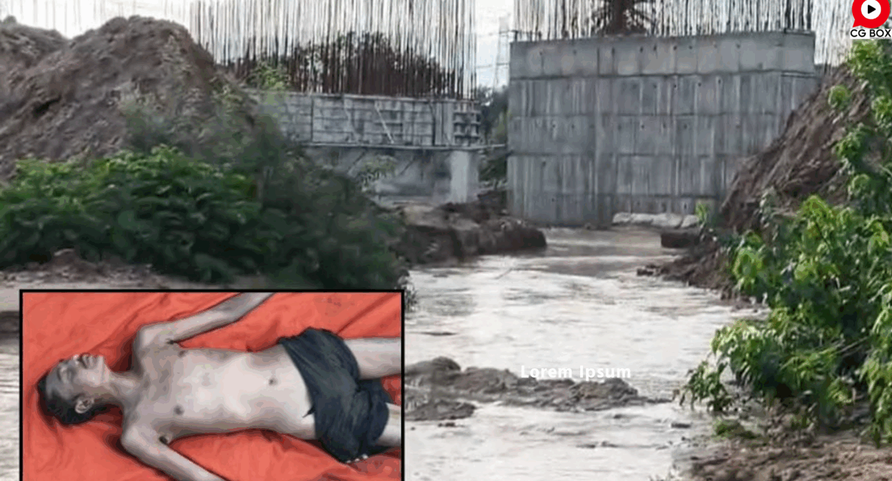 "Rescue team members recovering the body of a laborer swept away by floodwaters near a culvert construction site in Korbi village, Korba district."